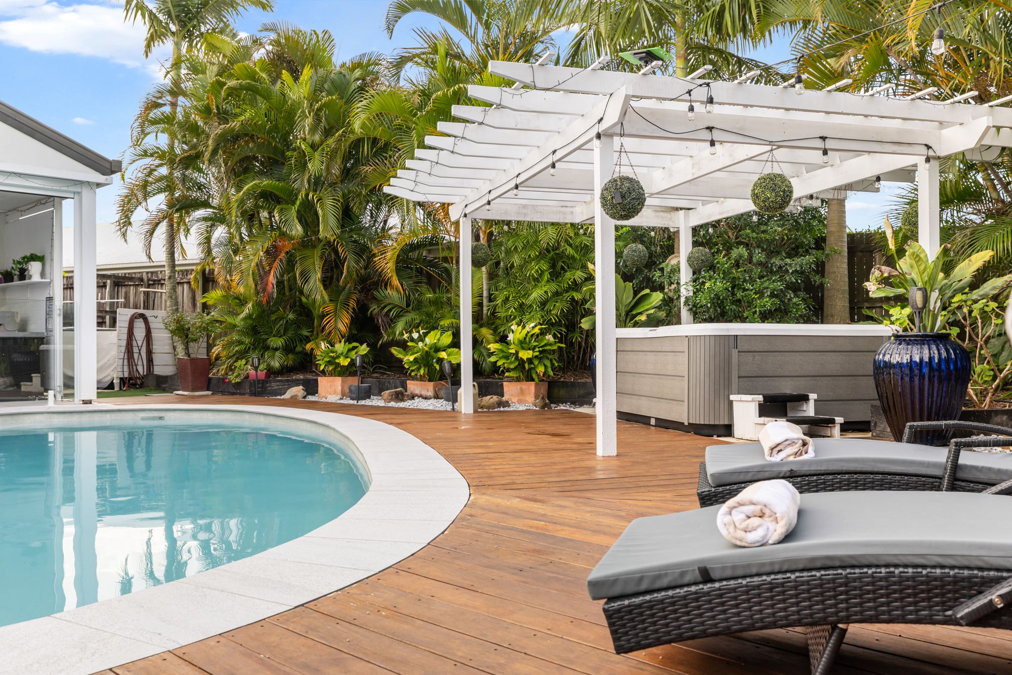 Pool with white pergola
