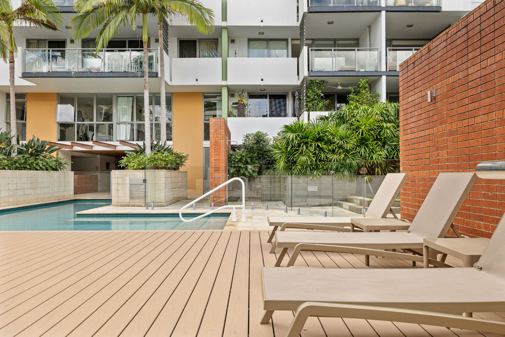 Resort pool with loungers